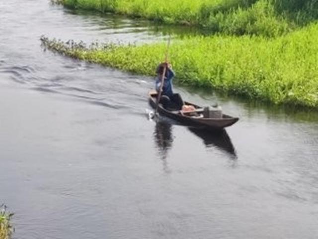 A_fisher_in_Yewa_river eddited 2